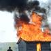 Firefighters watch as a small structure is engulfed in flames during a training exercise and controlled burn in 6700 block of Warner Rd. in Pittsfield Township on Thursday, May 9, 2013. Melanie Maxwell I AnnArbor.com